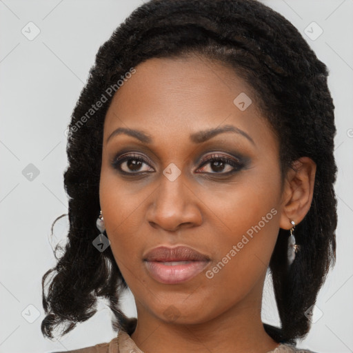 Joyful black young-adult female with medium  black hair and brown eyes