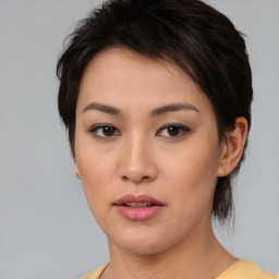 Neutral asian young-adult female with medium  brown hair and brown eyes