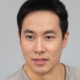 Neutral asian young-adult male with short  black hair and brown eyes