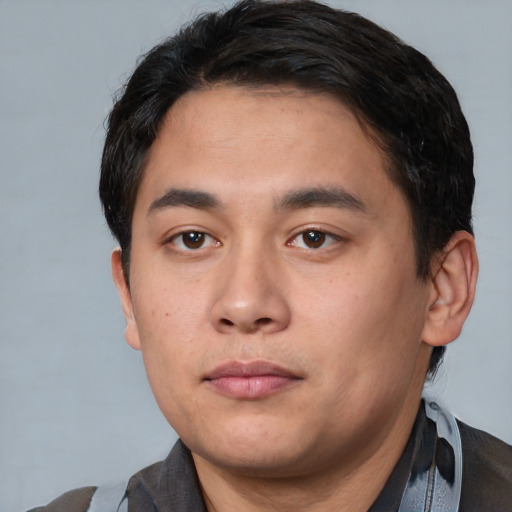 Neutral white young-adult male with short  black hair and brown eyes