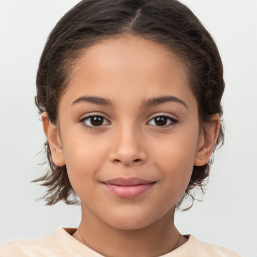 Joyful white child female with medium  brown hair and brown eyes