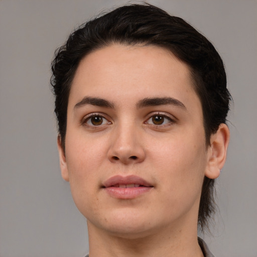 Joyful white young-adult female with medium  brown hair and brown eyes