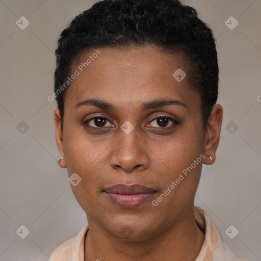 Joyful black young-adult female with short  black hair and brown eyes