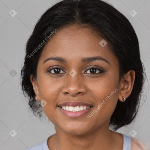 Joyful black young-adult female with medium  brown hair and brown eyes