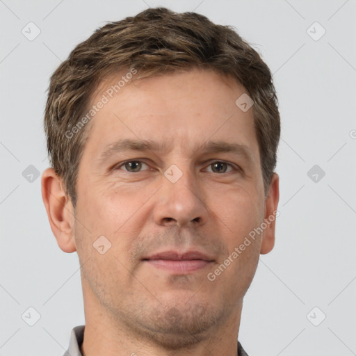 Neutral white adult male with short  brown hair and brown eyes