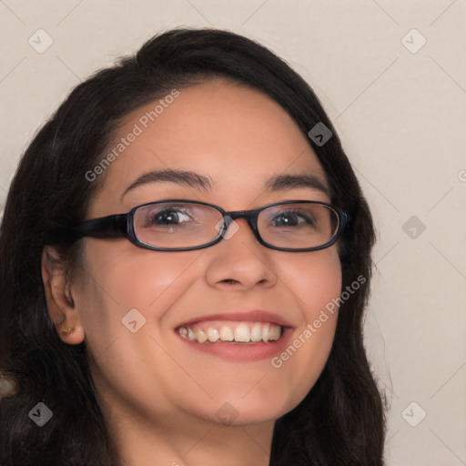 Joyful white young-adult female with long  black hair and brown eyes