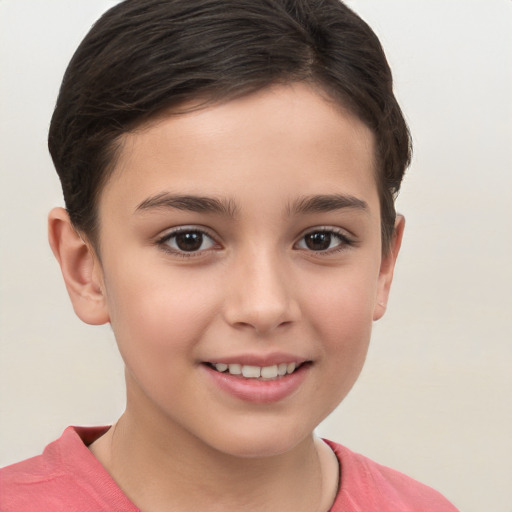 Joyful white child female with short  brown hair and brown eyes