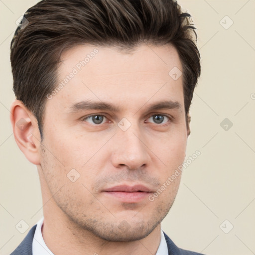 Neutral white young-adult male with short  brown hair and brown eyes