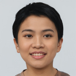 Joyful asian young-adult female with short  black hair and brown eyes