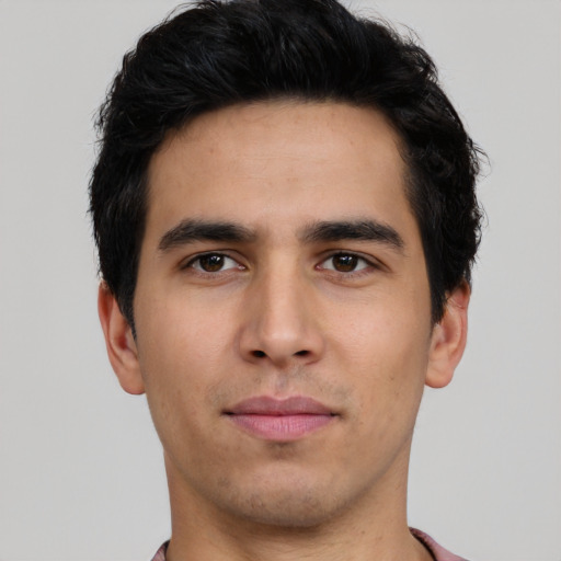 Neutral white young-adult male with short  black hair and brown eyes