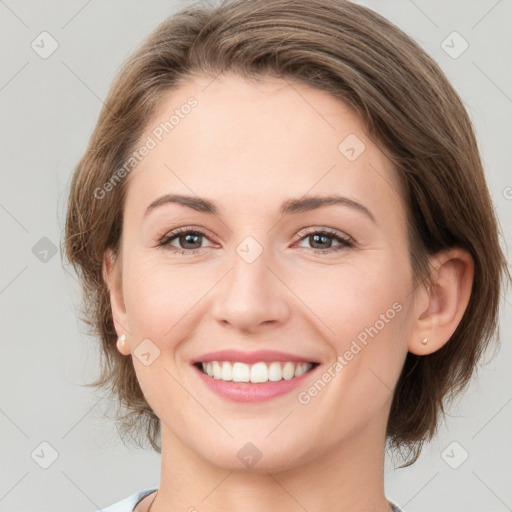 Joyful white young-adult female with medium  brown hair and green eyes