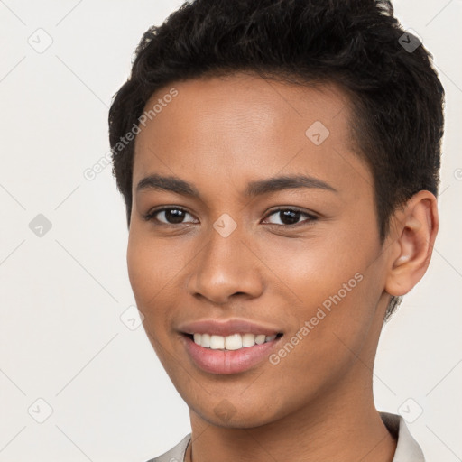 Joyful latino young-adult female with short  brown hair and brown eyes