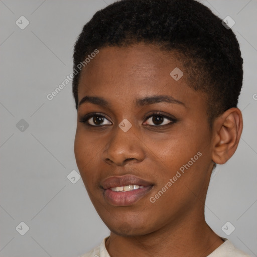 Joyful black young-adult female with short  brown hair and brown eyes