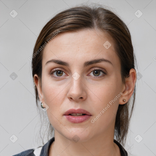 Neutral white young-adult female with medium  brown hair and grey eyes