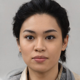 Joyful asian young-adult female with medium  black hair and brown eyes