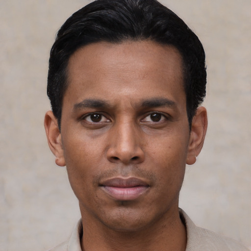 Neutral black young-adult male with short  black hair and brown eyes