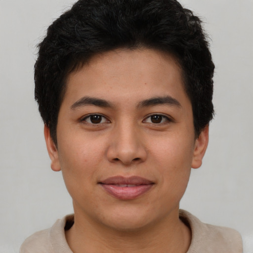 Joyful asian young-adult female with short  brown hair and brown eyes