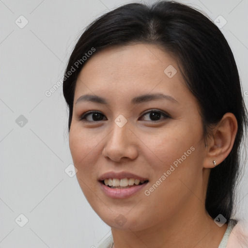 Joyful asian young-adult female with medium  brown hair and brown eyes