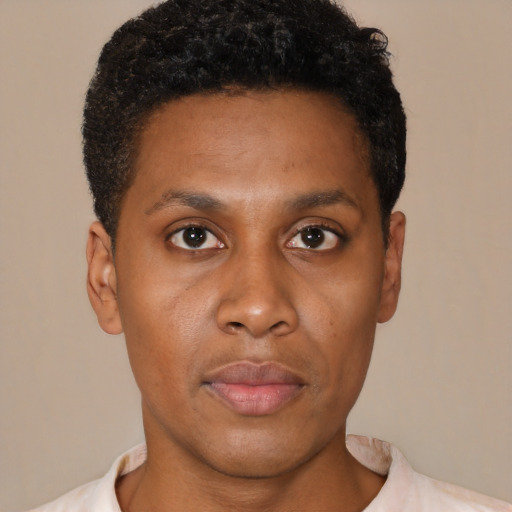 Neutral black young-adult male with short  brown hair and brown eyes