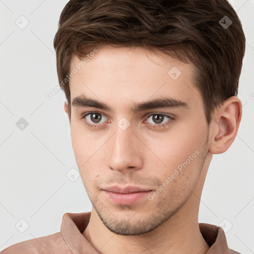 Neutral white young-adult male with short  brown hair and brown eyes