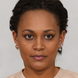 Neutral black young-adult female with short  brown hair and brown eyes