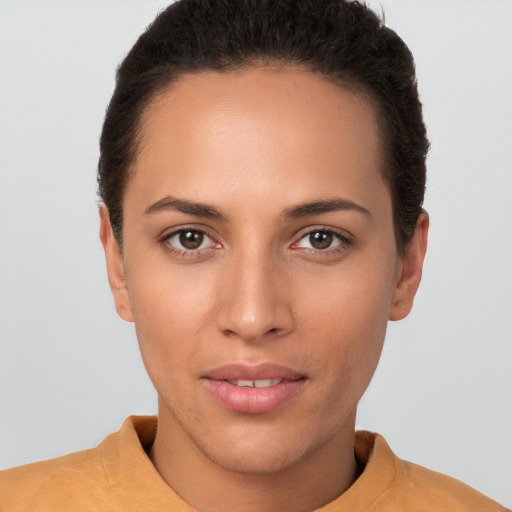 Joyful white young-adult female with short  brown hair and brown eyes