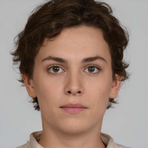 Neutral white young-adult female with short  brown hair and brown eyes