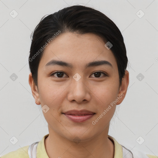 Joyful asian young-adult female with short  brown hair and brown eyes