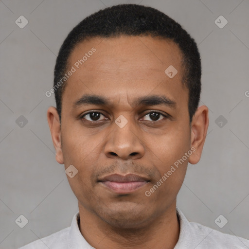 Neutral latino young-adult male with short  black hair and brown eyes