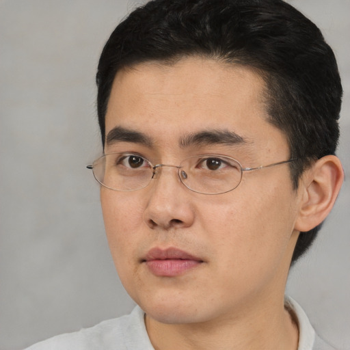 Neutral asian young-adult male with short  black hair and brown eyes