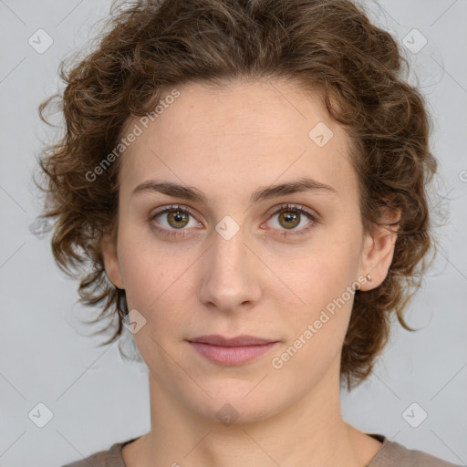 Joyful white young-adult female with medium  brown hair and green eyes