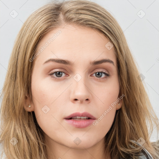 Neutral white young-adult female with long  brown hair and brown eyes