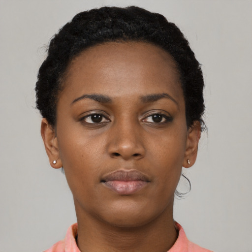Neutral black young-adult female with short  black hair and brown eyes