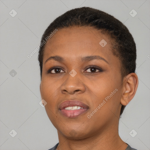 Joyful black young-adult female with short  black hair and brown eyes