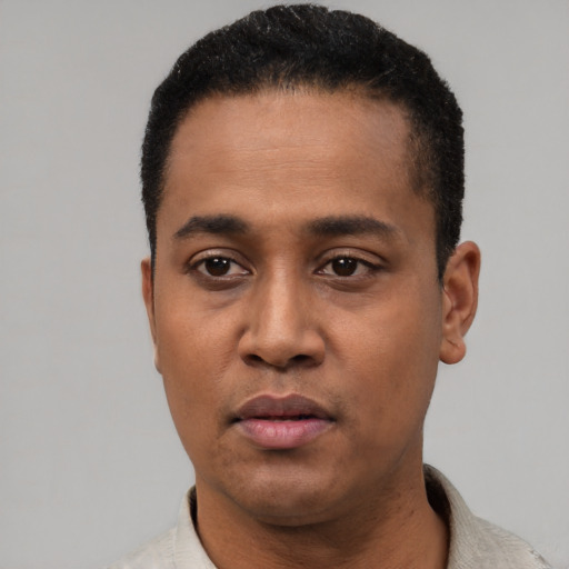 Neutral latino young-adult male with short  black hair and brown eyes