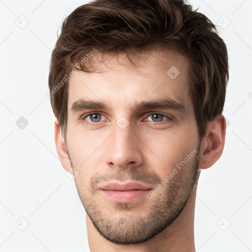 Neutral white young-adult male with short  brown hair and grey eyes