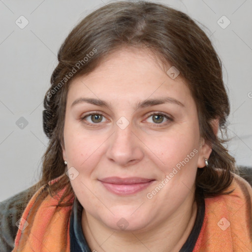 Joyful white young-adult female with medium  brown hair and green eyes