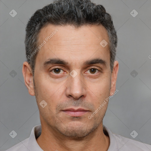 Neutral white adult male with short  black hair and brown eyes