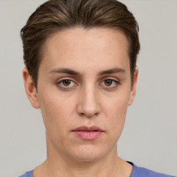 Neutral white young-adult female with short  brown hair and brown eyes