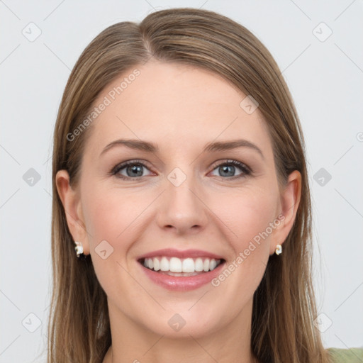 Joyful white young-adult female with long  brown hair and grey eyes