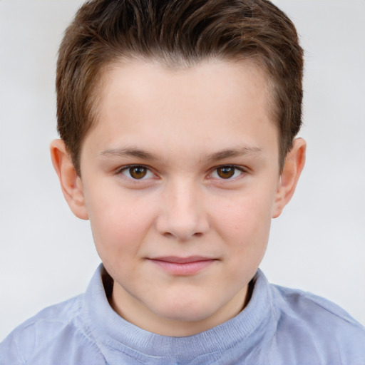 Joyful white child male with short  brown hair and grey eyes