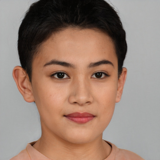 Joyful asian young-adult female with short  brown hair and brown eyes