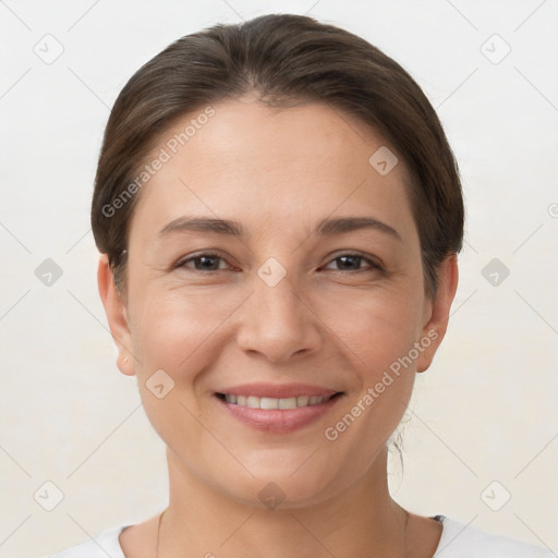 Joyful white young-adult female with short  brown hair and brown eyes