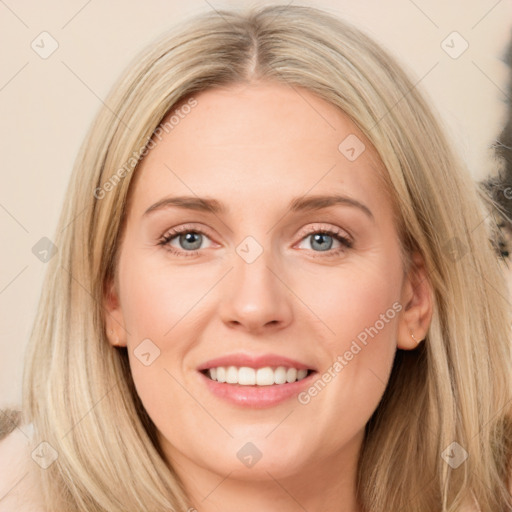 Joyful white young-adult female with long  brown hair and green eyes