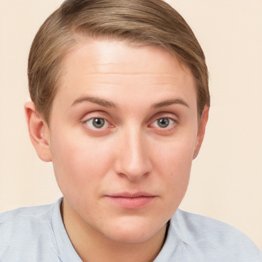 Joyful white young-adult female with short  brown hair and grey eyes