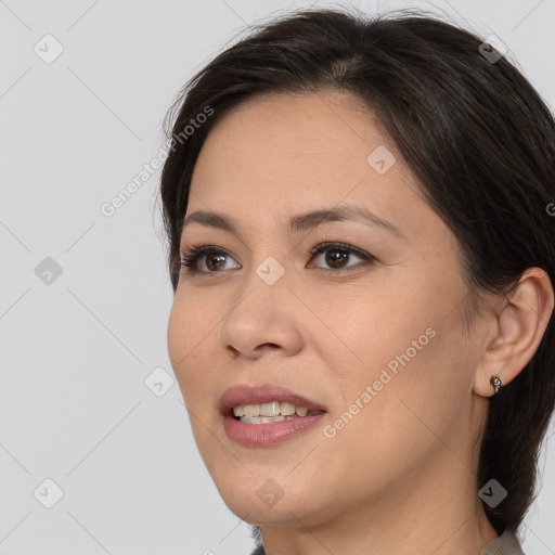 Joyful white young-adult female with medium  brown hair and brown eyes