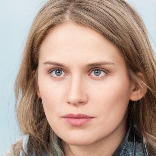 Neutral white young-adult female with long  brown hair and blue eyes