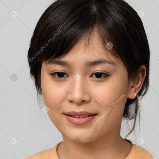 Joyful asian young-adult female with medium  brown hair and brown eyes