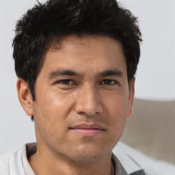 Neutral asian young-adult male with short  brown hair and brown eyes