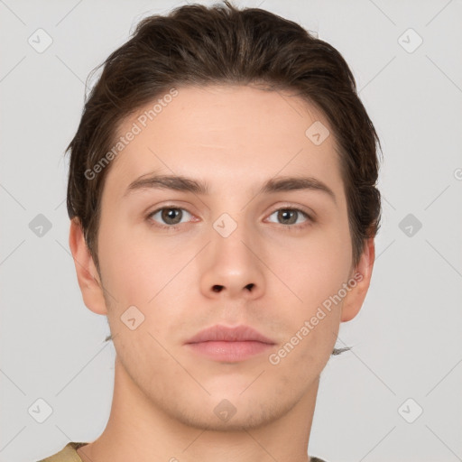 Neutral white young-adult male with short  brown hair and brown eyes